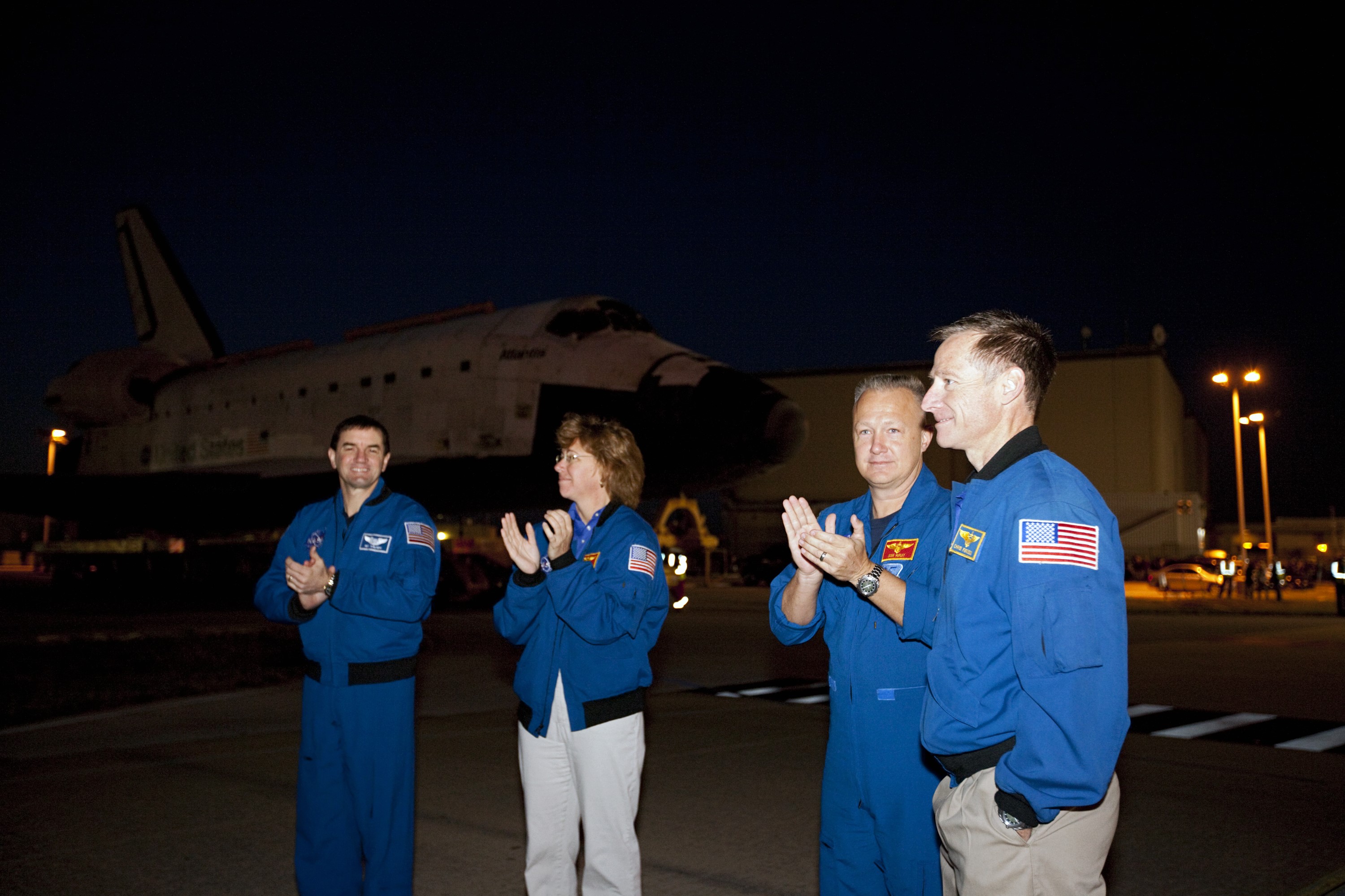 CAPE CANAVERAL, Fla. – NASA's STS-135 crew, from the left, mission specialists Rex Walheim and Sandy Magnus, along with pilot Doug Hurley and commander Chris Ferguson, are on hand as the Space shuttle Atlantis moves out of the Vehicle Assembly Building at NASA's Kennedy Space Center in Florida for its 10-mile trip to the Kennedy Visitor Complex where it will be put on public display. As part of transition and retirement of the Space Shuttle Program, Atlantis is to be displayed at Kennedy's Visitor Complex beginning in the summer of 2013. Over the course of its 26-year career, Atlantis traveled 125,935,769 miles during 307 days in space over 33 missions. For more information, visit http://www.nasa.gov/transition Photo credit: NASA/ Kim Shiflett