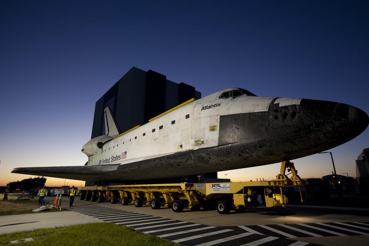 CAPE CANAVERAL, Fla. – At NASA's Kennedy Space Center in Florida, the space shuttle Atlantis is transported on a 10-mile journey to the Kennedy Visitor Complex where it will be put on public display.      As part of transition and retirement of the Space Shuttle Program, Atlantis is to be displayed at Kennedy's Visitor Complex beginning in the summer of 2013. Over the course of its 26-year career, Atlantis traveled 125,935,769 miles during 307 days in space over 33 missions. For more information, visit http://www.nasa.gov/transition Photo credit: NASA/ Kim Shiflett