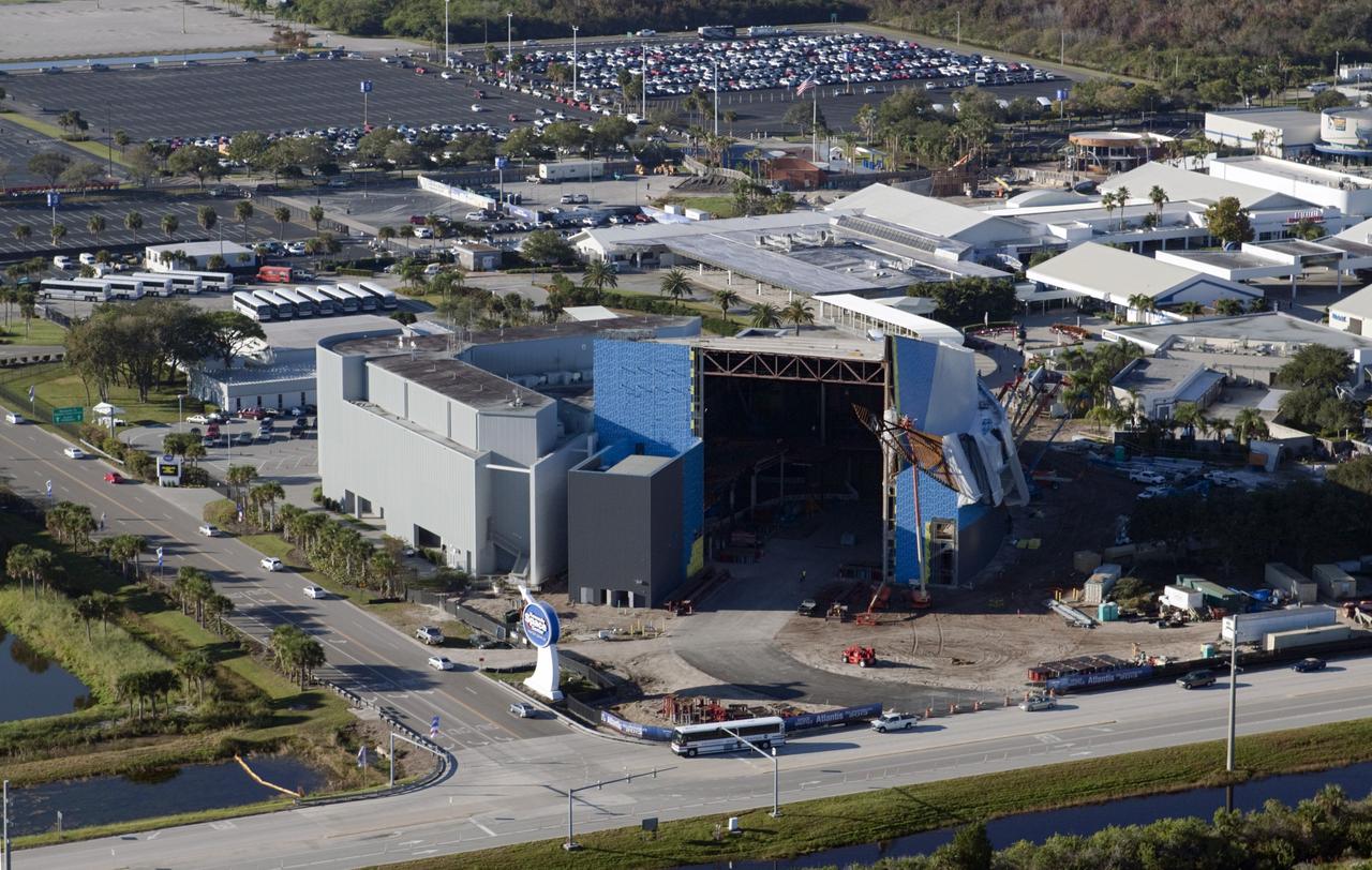 CAPE CANAVERAL, Fla. – An aerial view of the Kennedy Space Center visitor complex, including the facility where the space shuttle Atlantis will be put on public display.      As part of transition and retirement of the Space Shuttle Program, Atlantis is to be displayed at Kennedy's Visitor Complex beginning in the summer of 2013. Over the course of its 26-year career, Atlantis traveled 125,935,769 miles during 307 days in space over 33 missions. For more information, visit http://www.nasa.gov/transition Photo credit: NASA/ Kim Shiflett