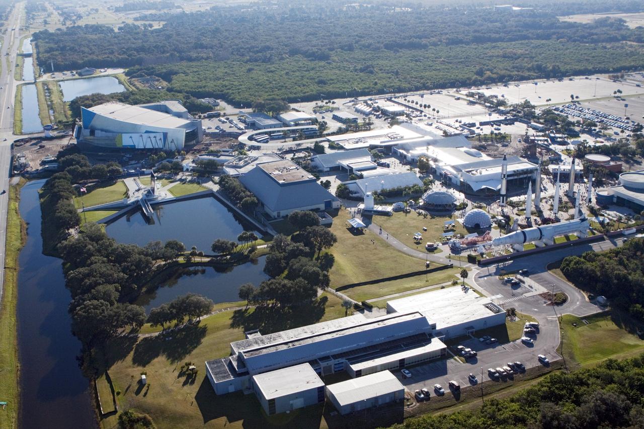 CAPE CANAVERAL, Fla. – An aerial view of the Kennedy Space Center visitor complex, including the facility where the space shuttle Atlantis will be put on public display.      As part of transition and retirement of the Space Shuttle Program, Atlantis is to be displayed at Kennedy's Visitor Complex beginning in the summer of 2013. Over the course of its 26-year career, Atlantis traveled 125,935,769 miles during 307 days in space over 33 missions. For more information, visit http://www.nasa.gov/transition Photo credit: NASA/ Kim Shiflett