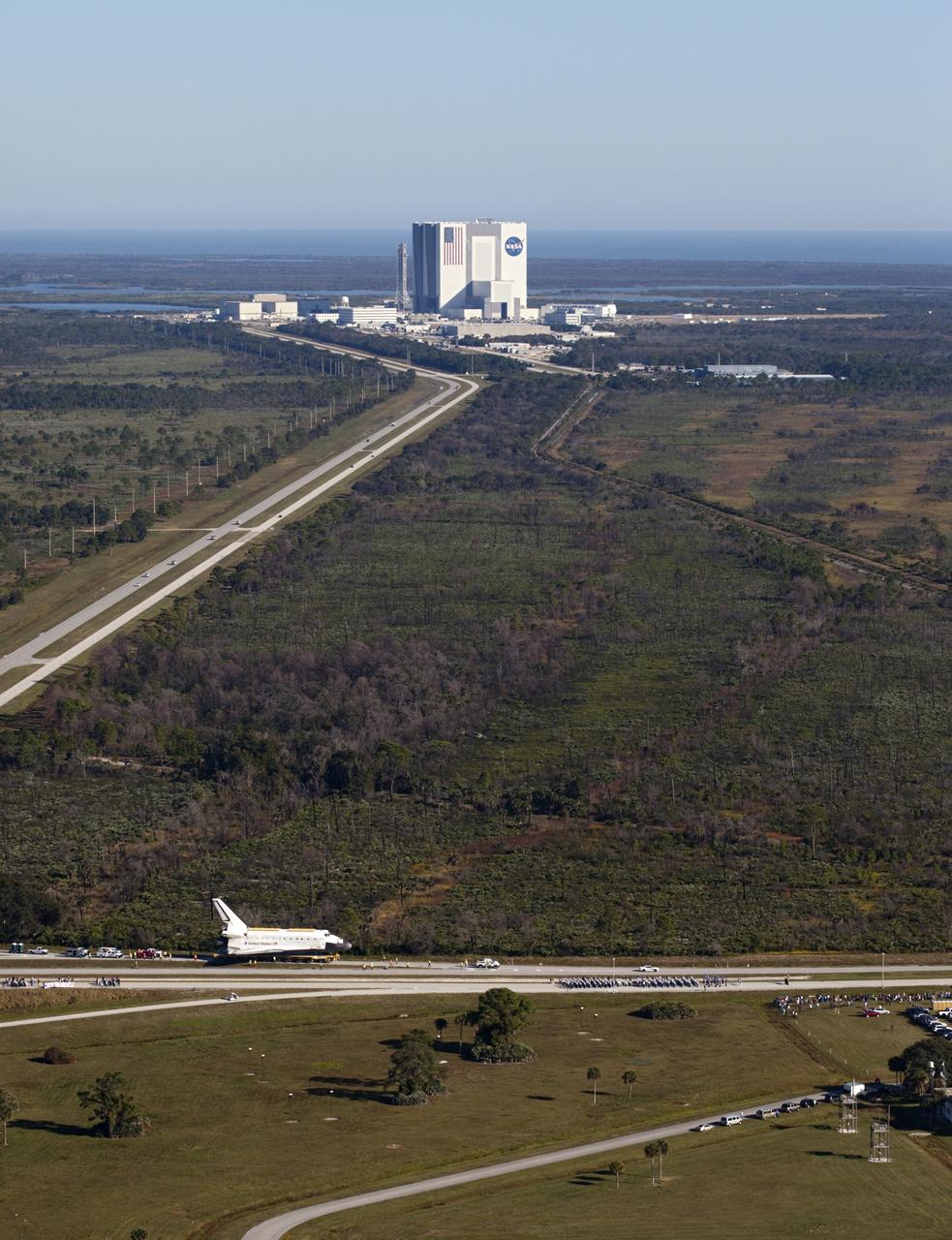 CAPE CANAVERAL, Fla. – Space shuttle Atlantis is transported along NASA Causeway at NASA's Kennedy Space Center in Florida on its 10-mile journey to the Kennedy Space Center Visitor Complex where it will be put on public display. As part of transition and retirement of the Space Shuttle Program, Atlantis is to be displayed at Kennedy's Visitor Complex beginning in the summer of 2013. Over the course of its 26-year career, Atlantis traveled 125,935,769 miles during 307 days in space over 33 missions. For more information, visit http://www.nasa.gov/transition Photo credit: NASA/ Kim Shiflett