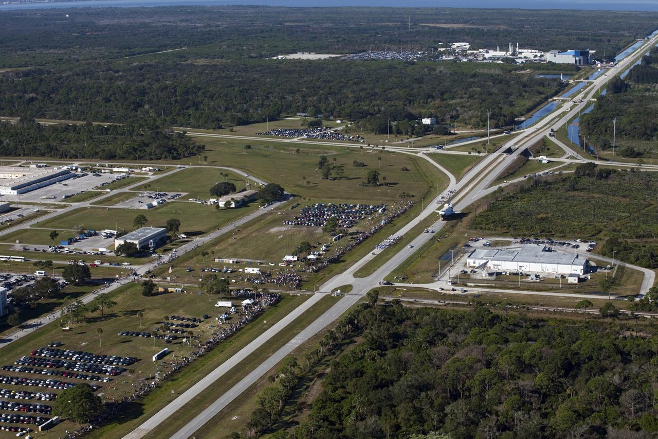 CAPE CANAVERAL, Fla. – Space shuttle Atlantis is transported along NASA Causeway at NASA's Kennedy Space Center in Florida on its 10-mile journey to the Kennedy Space Center Visitor Complex where it will be put on public display. As part of transition and retirement of the Space Shuttle Program, Atlantis is to be displayed at Kennedy's Visitor Complex beginning in the summer of 2013. Over the course of its 26-year career, Atlantis traveled 125,935,769 miles during 307 days in space over 33 missions. For more information, visit http://www.nasa.gov/transition Photo credit: NASA/ Kim Shiflett