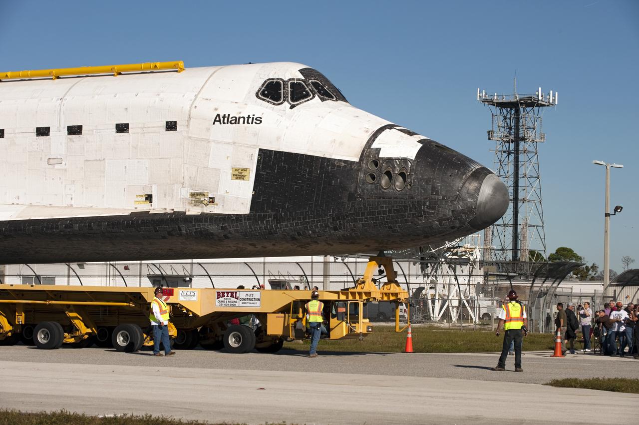 CAPE CANAVERAL, Fla. – Space shuttle Atlantis is transported along NASA Causeway at NASA's Kennedy Space Center in Florida on its 10-mile journey to the Kennedy Space Center Visitor Complex where it will be put on public display. As part of transition and retirement of the Space Shuttle Program, Atlantis is to be displayed at Kennedy's Visitor Complex beginning in the summer of 2013. Over the course of its 26-year career, Atlantis traveled 125,935,769 miles during 307 days in space over 33 missions. For more information, visit http://www.nasa.gov/transition Photo credit: NASA/ Tony Gray