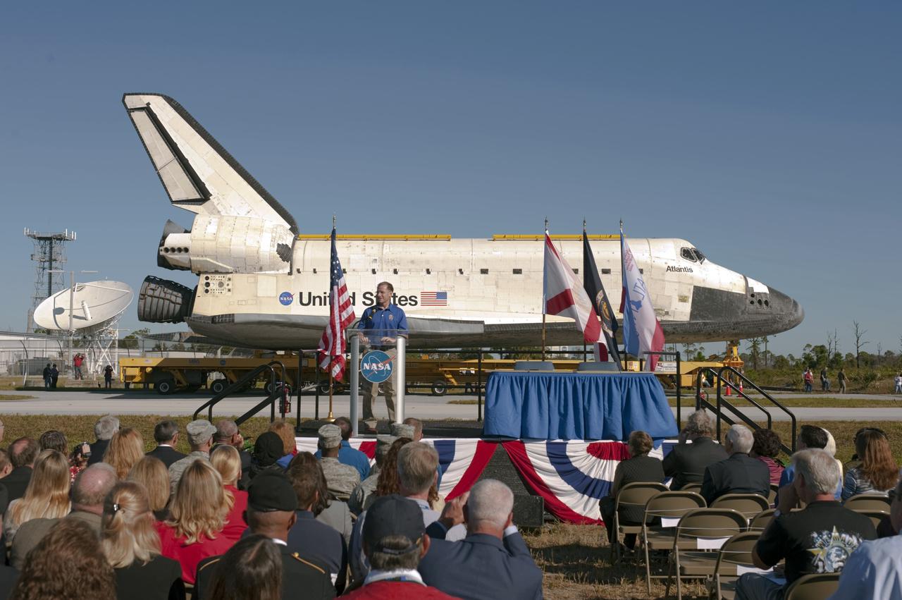 CAPE CANAVERAL, Fla. – At NASA's Kennedy Space Center in Florida, the space shuttle Atlantis pauses during its 10-mile journey to the Kennedy Visitor Complex for a ceremony to commemorate the transfer. Astronaut Chris Ferguson, who commanded Atlantis's final mission, STS-135 in 2011, spoke Kennedy employees and guests at the event.      As part of transition and retirement of the Space Shuttle Program, Atlantis is to be displayed at Kennedy's Visitor Complex beginning in the summer of 2013. Over the course of its 26-year career, Atlantis traveled 125,935,769 miles during 307 days in space over 33 missions. For more information, visit http://www.nasa.gov/transition Photo credit: NASA/ Tony Gray