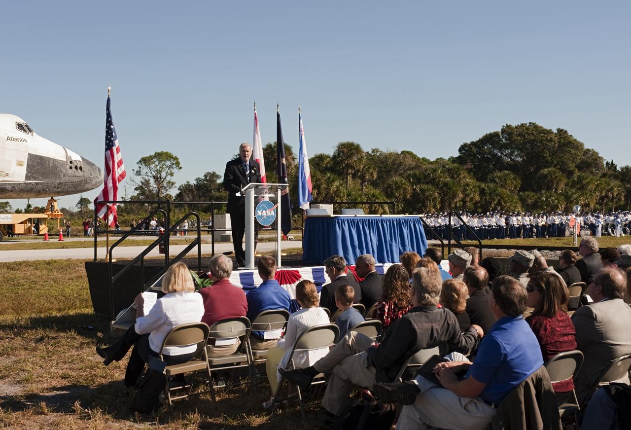 CAPE CANAVERAL, Fla. – At NASA's Kennedy Space Center in Florida, the space shuttle Atlantis pauses during its 10-mile journey to the Kennedy Visitor Complex for a ceremony to commemorate the transfer. Delaware North Companies Parks and Resorts Chief Operating Officer Bill Moore spoke Kennedy employees and guests at the event.      As part of transition and retirement of the Space Shuttle Program, Atlantis is to be displayed at Kennedy's Visitor Complex beginning in the summer of 2013. Over the course of its 26-year career, Atlantis traveled 125,935,769 miles during 307 days in space over 33 missions. For more information, visit http://www.nasa.gov/transition Photo credit: NASA/ Tony Gray