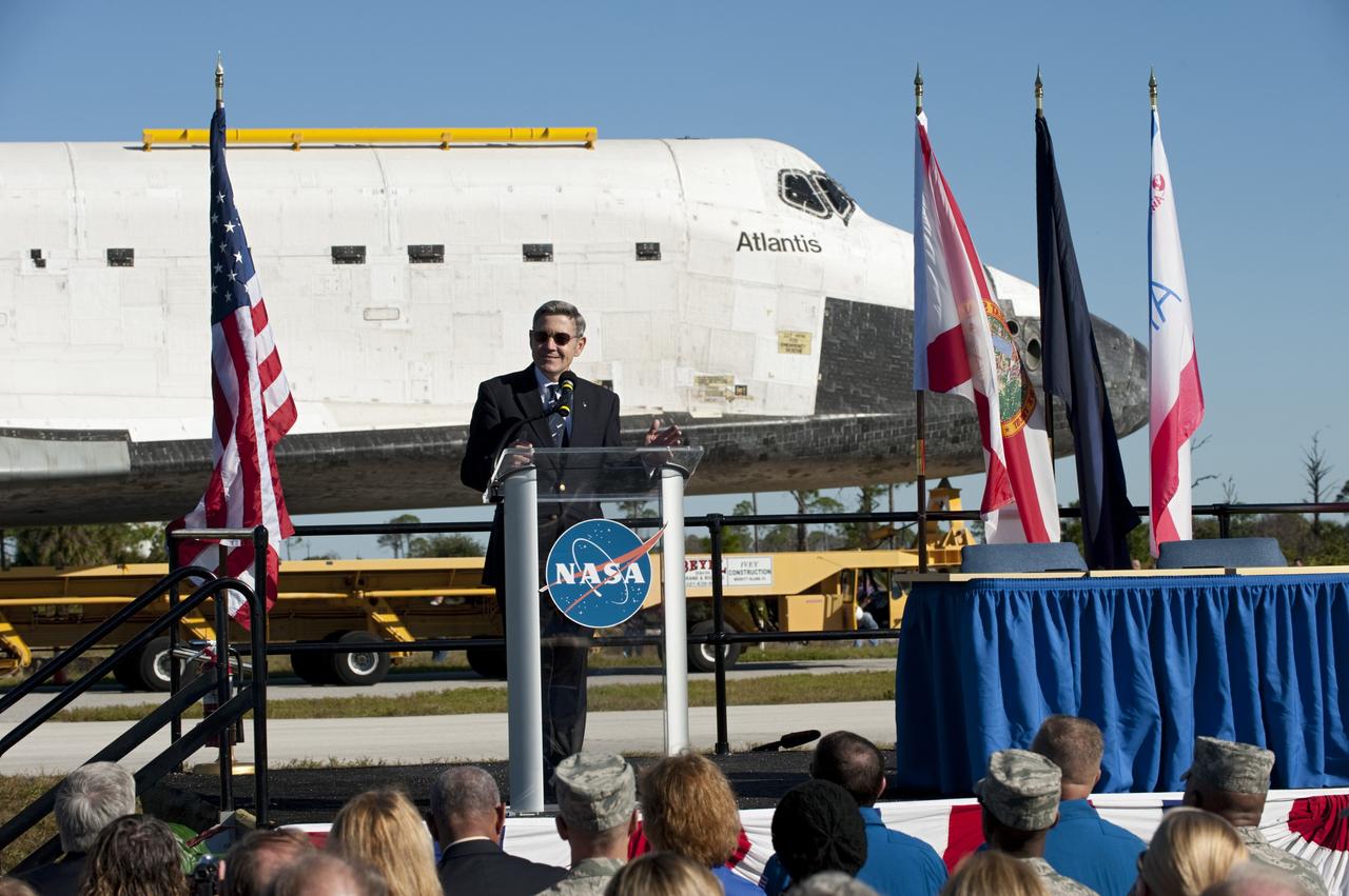 CAPE CANAVERAL, Fla. – At NASA's Kennedy Space Center in Florida, the space shuttle Atlantis pauses during its 10-mile journey to the Kennedy Visitor Complex for a ceremony to commemorate the transfer. Kennedy Director Bob Cabana spoke Kennedy employees and guests at the event.      As part of transition and retirement of the Space Shuttle Program, Atlantis is to be displayed at Kennedy's Visitor Complex beginning in the summer of 2013. Over the course of its 26-year career, Atlantis traveled 125,935,769 miles during 307 days in space over 33 missions. For more information, visit http://www.nasa.gov/transition Photo credit: NASA/ Tony Gray