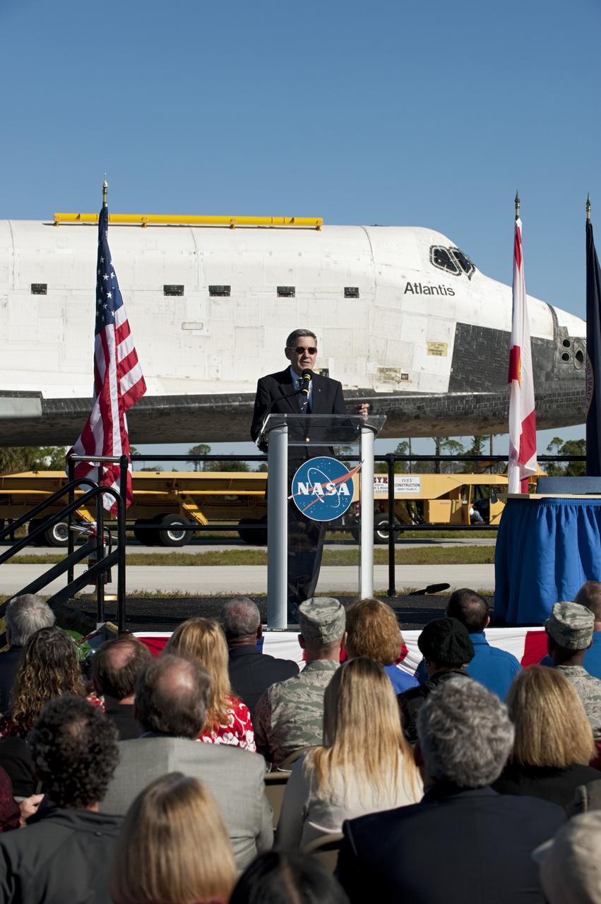 CAPE CANAVERAL, Fla. – At NASA's Kennedy Space Center in Florida, the space shuttle Atlantis pauses during its 10-mile journey to the Kennedy Visitor Complex for a ceremony to commemorate the transfer. Kennedy Director Bob Cabana spoke Kennedy employees and guests at the event.      As part of transition and retirement of the Space Shuttle Program, Atlantis is to be displayed at Kennedy's Visitor Complex beginning in the summer of 2013. Over the course of its 26-year career, Atlantis traveled 125,935,769 miles during 307 days in space over 33 missions. For more information, visit http://www.nasa.gov/transition Photo credit: NASA/Tony Gray