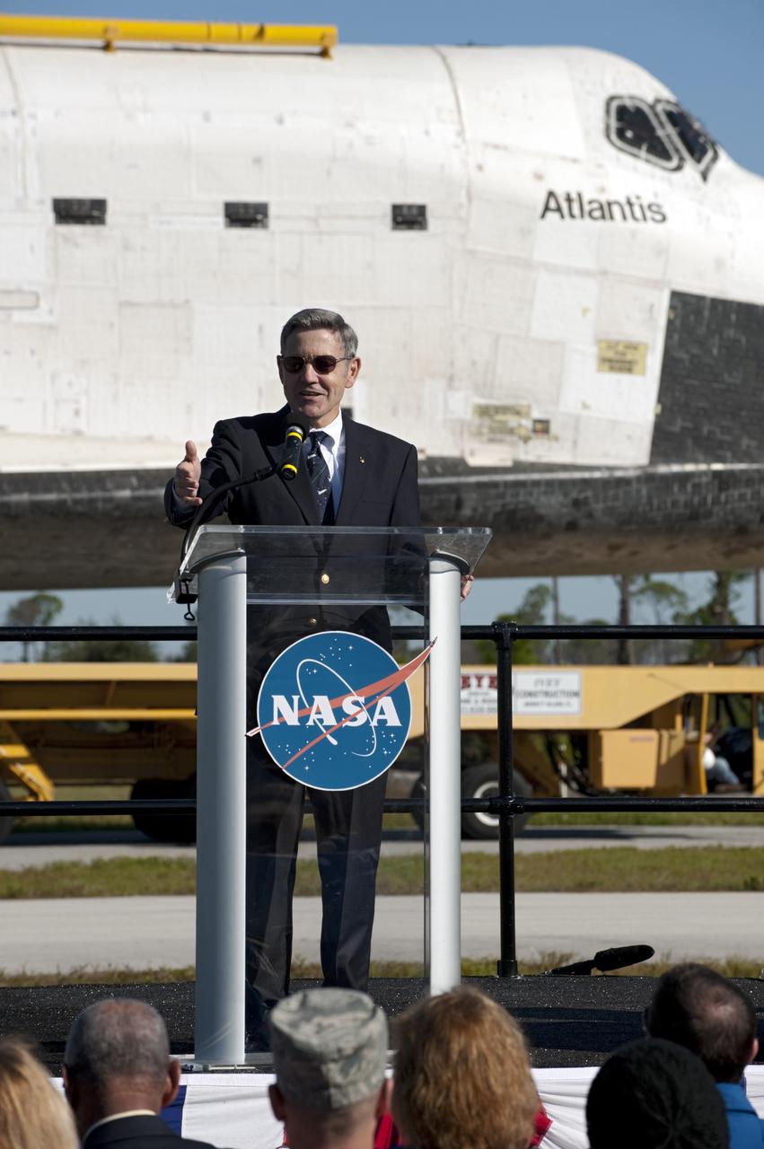 CAPE CANAVERAL, Fla. – At NASA's Kennedy Space Center in Florida, the space shuttle Atlantis pauses during its 10-mile journey to the Kennedy Visitor Complex for a ceremony to commemorate the transfer. Kennedy Director Bob Cabana spoke Kennedy employees and guests at the event.      As part of transition and retirement of the Space Shuttle Program, Atlantis is to be displayed at Kennedy's Visitor Complex beginning in the summer of 2013. Over the course of its 26-year career, Atlantis traveled 125,935,769 miles during 307 days in space over 33 missions. For more information, visit http://www.nasa.gov/transition Photo credit: NASA/Tony Gray