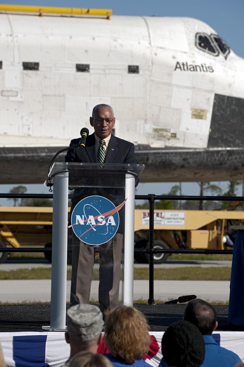 CAPE CANAVERAL, Fla. – At NASA's Kennedy Space Center in Florida, the space shuttle Atlantis pauses during its 10-mile journey to the Kennedy Visitor Complex for a ceremony to commemorate the transfer. NASA Administrator Charles Bolden spoke Kennedy employees and guests at the event.      As part of transition and retirement of the Space Shuttle Program, Atlantis is to be displayed at Kennedy's Visitor Complex beginning in the summer of 2013. Over the course of its 26-year career, Atlantis traveled 125,935,769 miles during 307 days in space over 33 missions. For more information, visit http://www.nasa.gov/transition Photo credit: NASA/Tony Gray