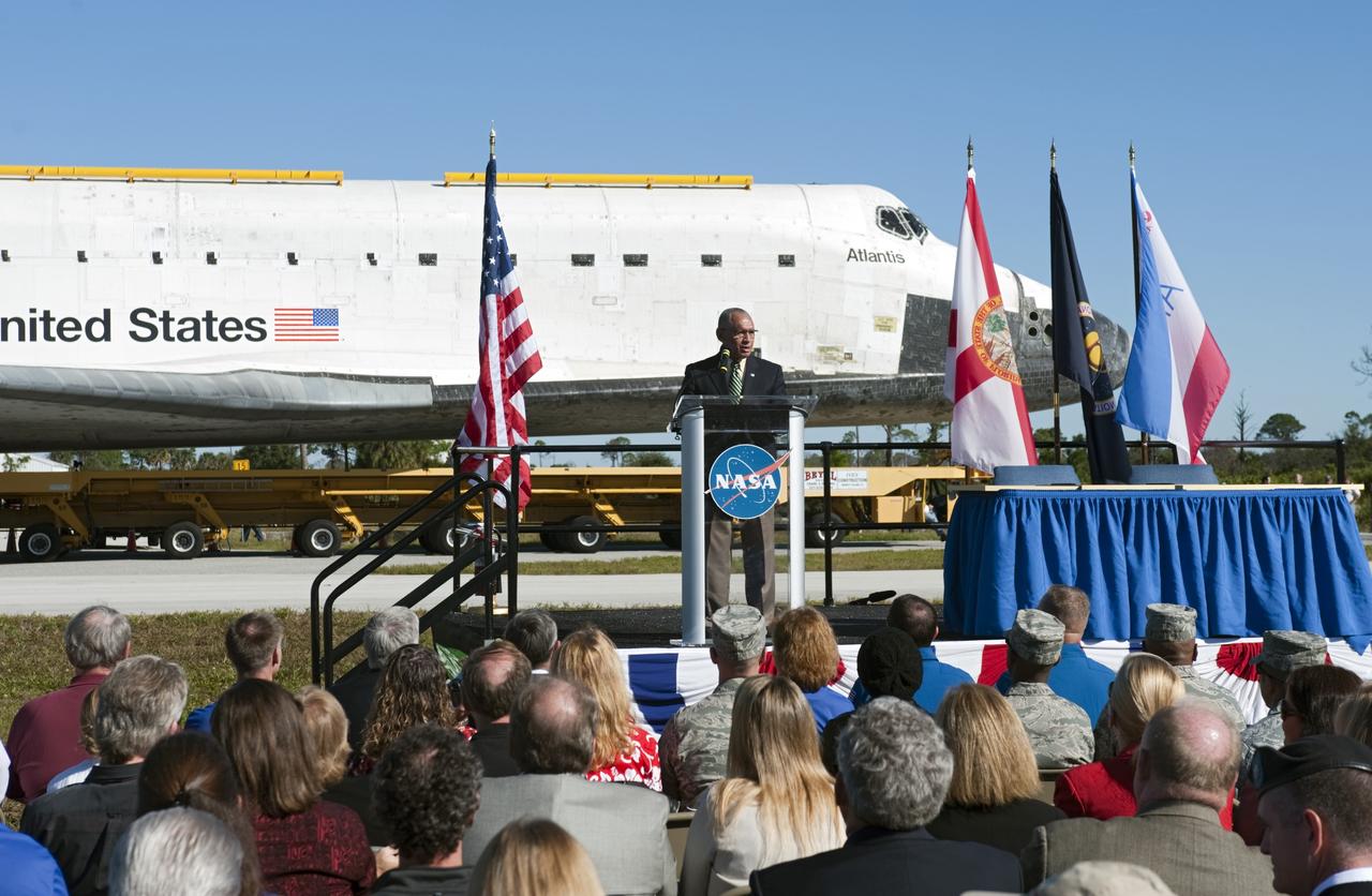 CAPE CANAVERAL, Fla. – At NASA's Kennedy Space Center in Florida, the space shuttle Atlantis pauses during its 10-mile journey to the Kennedy Visitor Complex for a ceremony to commemorate the transfer. NASA Administrator Charles Bolden spoke Kennedy employees and guests at the event.      As part of transition and retirement of the Space Shuttle Program, Atlantis is to be displayed at Kennedy's Visitor Complex beginning in the summer of 2013. Over the course of its 26-year career, Atlantis traveled 125,935,769 miles during 307 days in space over 33 missions. For more information, visit http://www.nasa.gov/transition Photo credit: NASA/Tony Gray