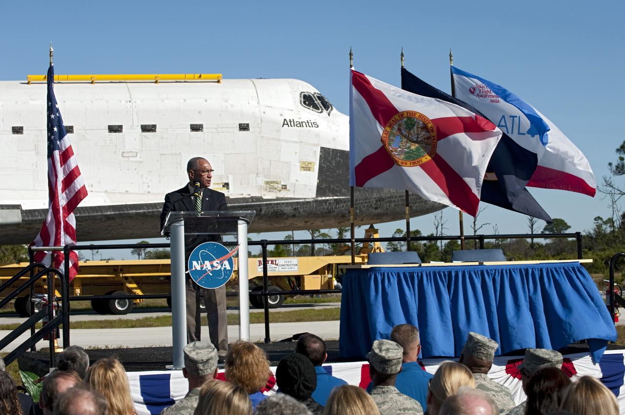 CAPE CANAVERAL, Fla. – At NASA's Kennedy Space Center in Florida, the space shuttle Atlantis pauses during its 10-mile journey to the Kennedy Visitor Complex for a ceremony to commemorate the transfer. NASA Administrator Charles Bolden spoke Kennedy employees and guests at the event.      As part of transition and retirement of the Space Shuttle Program, Atlantis is to be displayed at Kennedy's Visitor Complex beginning in the summer of 2013. Over the course of its 26-year career, Atlantis traveled 125,935,769 miles during 307 days in space over 33 missions. For more information, visit http://www.nasa.gov/transition Photo credit: NASA/Tony Gray