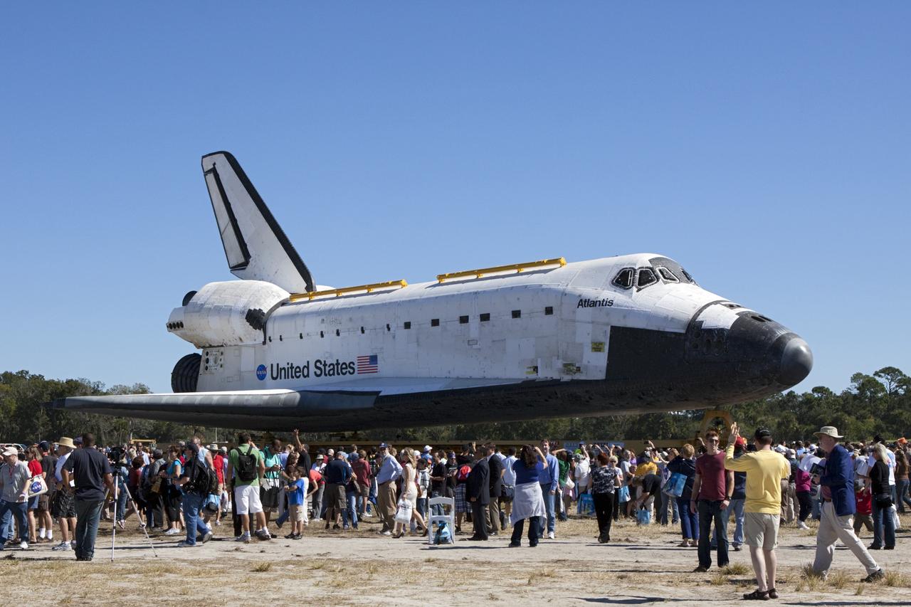 CAPE CANAVERAL, Fla. – The space shuttle Atlantis arrives at Space Florida's Exploration Park where it will pause during its 10-mile journey to the Kennedy Space Center Visitor Complex. The stop will provide a viewing opportunity for guests before completing the trip to its new home. As part of transition and retirement of the Space Shuttle Program, Atlantis is to be displayed at Kennedy's Visitor Complex beginning in the summer of 2013. Over the course of its 26-year career, Atlantis traveled 125,935,769 miles during 307 days in space over 33 missions. For more information, visit http://www.nasa.gov/transition Photo credit: NASA/ Jim Grossmann