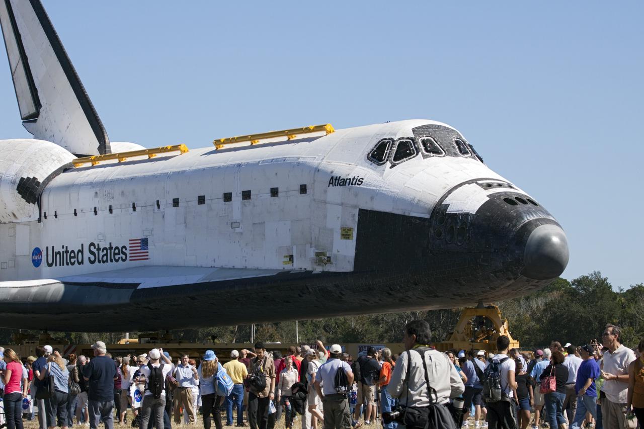 CAPE CANAVERAL, Fla. – The space shuttle Atlantis arrives at Space Florida's Exploration Park where it will pause during its 10-mile journey to the Kennedy Space Center Visitor Complex. The stop will provide a viewing opportunity for guests before completing the trip to its new home. As part of transition and retirement of the Space Shuttle Program, Atlantis is to be displayed at Kennedy's Visitor Complex beginning in the summer of 2013. Over the course of its 26-year career, Atlantis traveled 125,935,769 miles during 307 days in space over 33 missions. For more information, visit http://www.nasa.gov/transition Photo credit: NASA/ Jim Grossmann