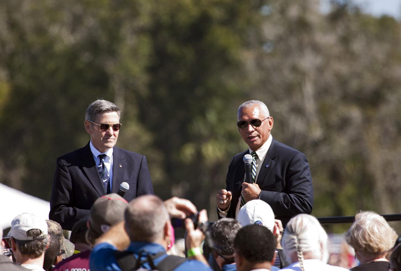 CAPE CANAVERAL, Fla. – Kennedy Space Center Director Bob Cabana, left, and NASA Administrator Charles Bolden speak to guests at Space Florida's Exploration Park where the space shuttle Atlantis pauses during its 10-mile journey to the Kennedy Visitor Complex. As part of transition and retirement of the Space Shuttle Program, Atlantis is to be displayed at Kennedy's Visitor Complex beginning in the summer of 2013. Over the course of its 26-year career, Atlantis traveled 125,935,769 miles during 307 days in space over 33 missions. For more information, visit http://www.nasa.gov/transition Photo credit: NASA/ Jim Grossmann
