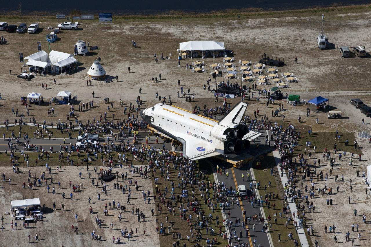 CAPE CANAVERAL, Fla. – At NASA's Kennedy Space Center in Florida, exhibits and displays in Space Florida's Exploration Park mark the site of space shuttle Atlantis' stop during its 10-mile journey from the Vehicle Assembly Building to the Kennedy Space Center Visitor Complex. Atlantis paused in the park for a viewing opportunity for visitor complex guests before completing the trip to its new home. As part of transition and retirement of the Space Shuttle Program, Atlantis will be displayed in a new exhibit hall at the visitor complex beginning in the summer of 2013. Over the course of its 26-year career, Atlantis traveled 125,935,769 miles, completing 33 missions during 307 days in space. For more information, visit http://www.nasa.gov/transition. Photo credit: NASA/Kim Shiflett