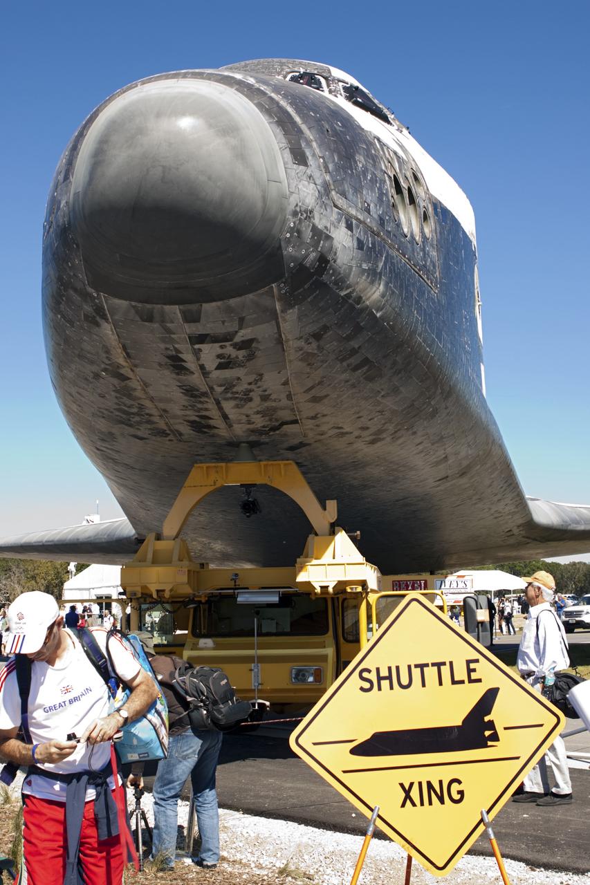 CAPE CANAVERAL, Fla. – The space shuttle Atlantis is viewed by guests at Space Florida's Exploration Park where it paused during its 10-mile journey to the Kennedy Space Center Visitor Complex. The stop will provide a viewing opportunity before completing the trip to its new home. As part of transition and retirement of the Space Shuttle Program, Atlantis is to be displayed at Kennedy's visitor complex beginning in the summer of 2013. Over the course of its 26-year career, Atlantis traveled 125,935,769 miles during 307 days in space over 33 missions. For more information, visit http://www.nasa.gov/transition. Photo credit: NASA/Jim Grossmann