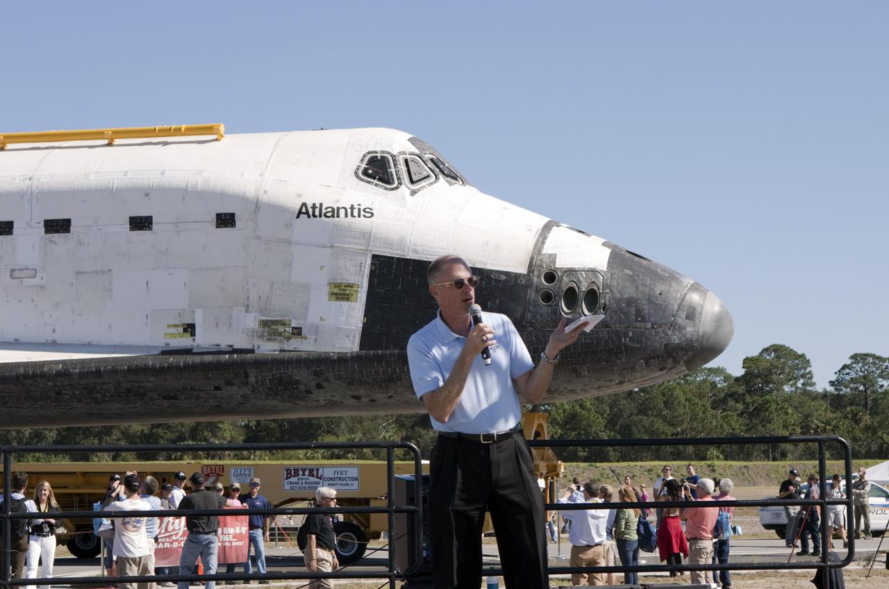 CAPE CANAVERAL, Fla. – Former space shuttle astronaut Rick Searfoss, now representing XCOR Aerospace, speaks to guests at Space Florida's Exploration Park where the space shuttle Atlantis pauses during its 10-mile journey to the Kennedy Visitor Complex.    As part of transition and retirement of the Space Shuttle Program, Atlantis is to be displayed at Kennedy's visitor complex beginning in the summer of 2013. Over the course of its 26-year career, Atlantis traveled 125,935,769 miles during 307 days in space over 33 missions. For more information, visit http://www.nasa.gov/transition. Photo credit: NASA/Jim Grossmann
