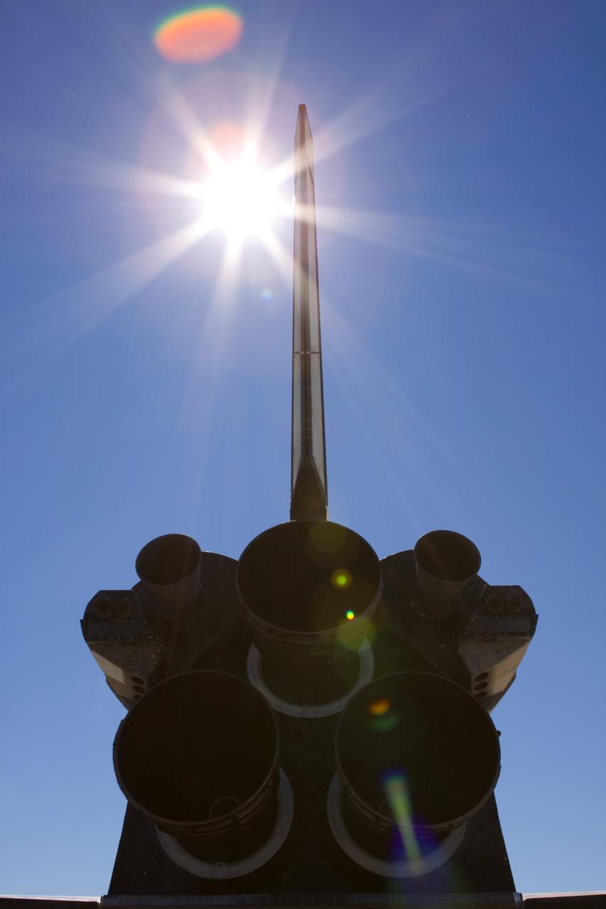 CAPE CANAVERAL, Fla. – The sun glares overhead as space shuttle Atlantis is on display for guests at Space Florida's Exploration Park where it paused during its 10-mile journey to the Kennedy Space Center Visitor Complex. The stop will provide a viewing opportunity before completing the trip to its new home. As part of transition and retirement of the Space Shuttle Program, Atlantis is to be displayed at Kennedy's visitor complex beginning in the summer of 2013. Over the course of its 26-year career, Atlantis traveled 125,935,769 miles during 307 days in space over 33 missions. For more information, visit http://www.nasa.gov/transition. Photo credit: NASA/Jim Grossmann