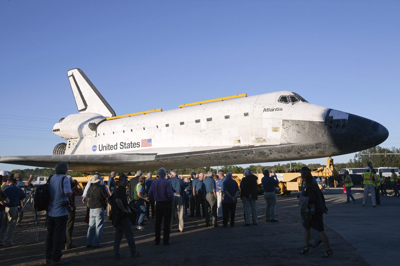 CAPE CANAVERAL, Fla. – Space shuttle Atlantis arrives at its destination, the Kennedy Space Center Visitor Complex in Florida, accompanied by an entourage including current and former astronauts. Atlantis has completed its 10-mile journey from Kennedy's Vehicle Assembly Building to its new home. As part of transition and retirement of the Space Shuttle Program, Atlantis will be displayed in a new exhibit hall at Kennedy's visitor complex beginning in the summer of 2013. Over the course of its 26-year career, Atlantis traveled 125,935,769 miles, completing 33 missions during 307 days in space. For more information, visit http://www.nasa.gov/transition. Photo credit: NASA/Kim Shiflett