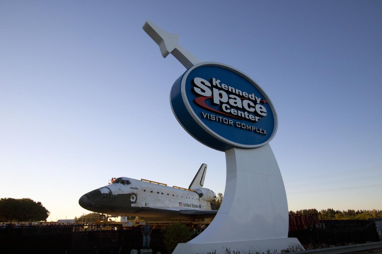 CAPE CANAVERAL, Fla. – Space shuttle Atlantis arrives at its new home, the Kennedy Space Center Visitor Complex in Florida. Atlantis completed its 10-mile journey from Kennedy's Vehicle Assembly Building with stops during the day for a transfer ceremony in Kennedy's Industrial Area and public viewing in Space Florida's Exploration Park. As part of transition and retirement of the Space Shuttle Program, Atlantis will be displayed in a new exhibit hall at the visitor complex beginning in the summer of 2013. Over the course of its 26-year career, Atlantis traveled 125,935,769 miles, completing 33 missions during 307 days in space. For more information, visit http://www.nasa.gov/transition. Photo credit: NASA/Jim Grossmann