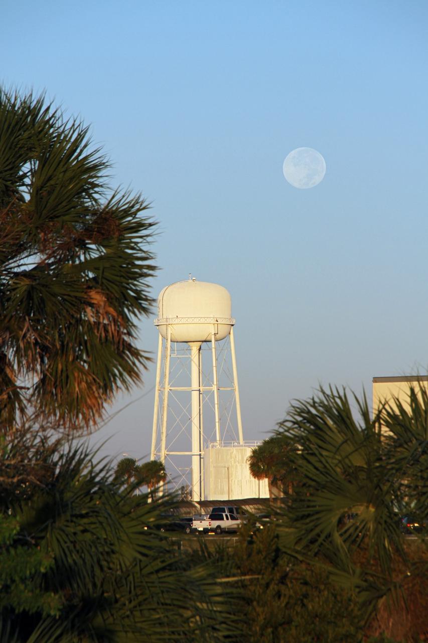 CAPE CANAVERAL, Fla. – A full moon is seen over a water tower near the Vehicle Assembly Building at NASA's Kennedy Space Center in Florida. Photo credit: NASA/Ben Smegelsky