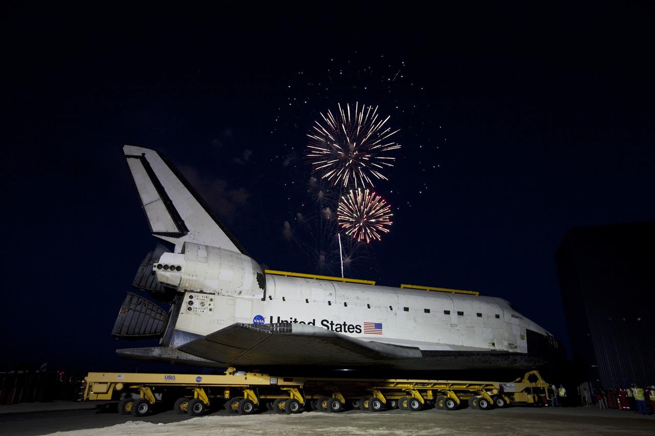CAPE CANAVERAL, Fla. – Fireworks celebrate the arrival of the space shuttle Atlantis at the Kennedy Space Center Visitor Complex following a 10-mile journey. As part of transition and retirement of the Space Shuttle Program, Atlantis is to be displayed at Kennedy's visitor complex beginning in the summer of 2013. Over the course of its 26-year career, Atlantis traveled 125,935,769 miles during 307 days in space over 33 missions. For more information, visit http://www.nasa.gov/transition. Photo credit: NASA/Kim Shiflett