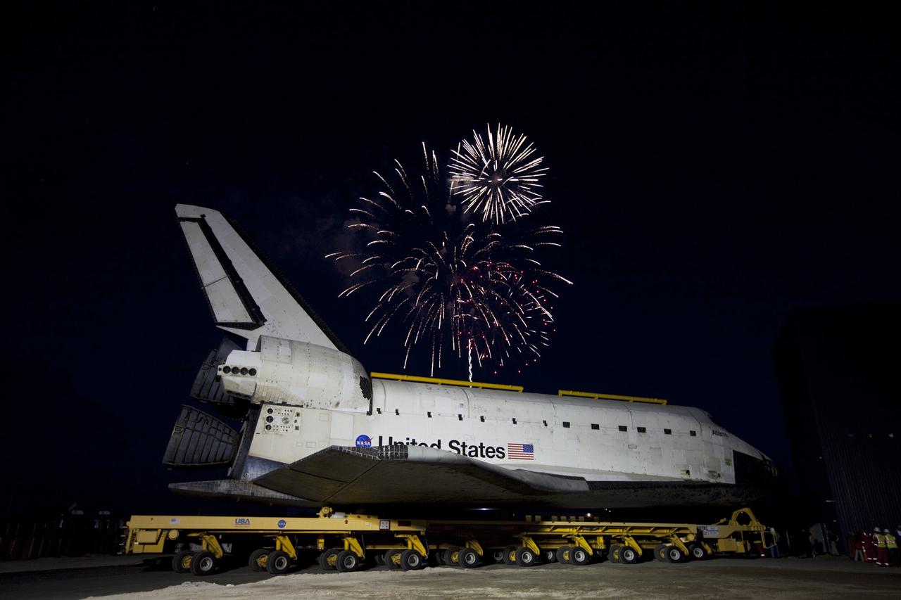CAPE CANAVERAL, Fla. – Fireworks celebrate the arrival of the space shuttle Atlantis at the Kennedy Space Center Visitor Complex following a 10-mile journey. As part of transition and retirement of the Space Shuttle Program, Atlantis is to be displayed at Kennedy's visitor complex beginning in the summer of 2013. Over the course of its 26-year career, Atlantis traveled 125,935,769 miles during 307 days in space over 33 missions. For more information, visit http://www.nasa.gov/transition. Photo credit: NASA/Kim Shiflett