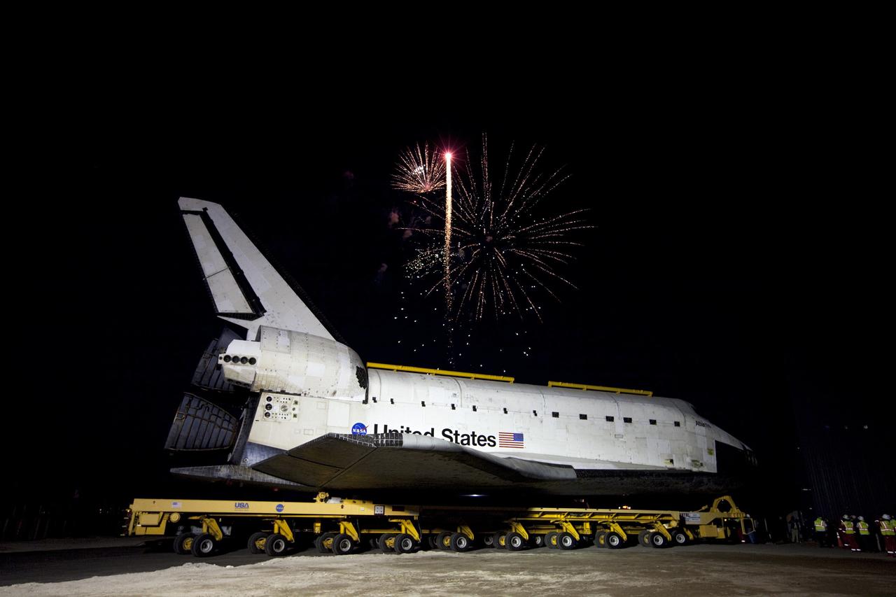 CAPE CANAVERAL, Fla. – Fireworks celebrate the arrival of the space shuttle Atlantis at the Kennedy Space Center Visitor Complex following a 10-mile journey. As part of transition and retirement of the Space Shuttle Program, Atlantis is to be displayed at Kennedy's visitor complex beginning in the summer of 2013. Over the course of its 26-year career, Atlantis traveled 125,935,769 miles during 307 days in space over 33 missions. For more information, visit http://www.nasa.gov/transition. Photo credit: NASA/Kim Shiflett