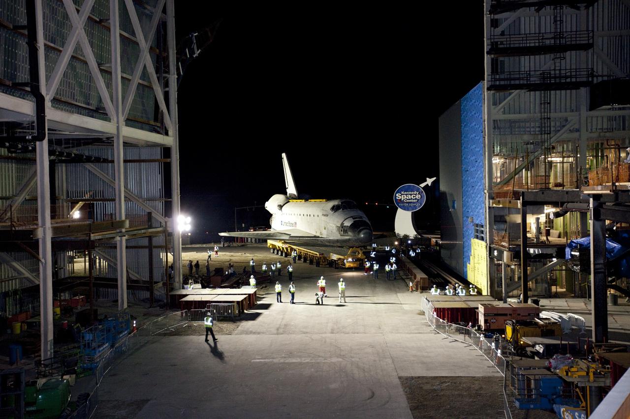 CAPE CANAVERAL, Fla. – The space shuttle Atlantis completes a 10-mile journey as it is moved into the Kennedy Space Center Visitor Complex facility that will serve as its new home. As part of transition and retirement of the Space Shuttle Program, Atlantis is to be displayed at Kennedy's visitor complex beginning in the summer of 2013. Over the course of its 26-year career, Atlantis traveled 125,935,769 miles during 307 days in space over 33 missions. For more information, visit http://www.nasa.gov/transition. Photo credit: NASA/Kim Shiflett