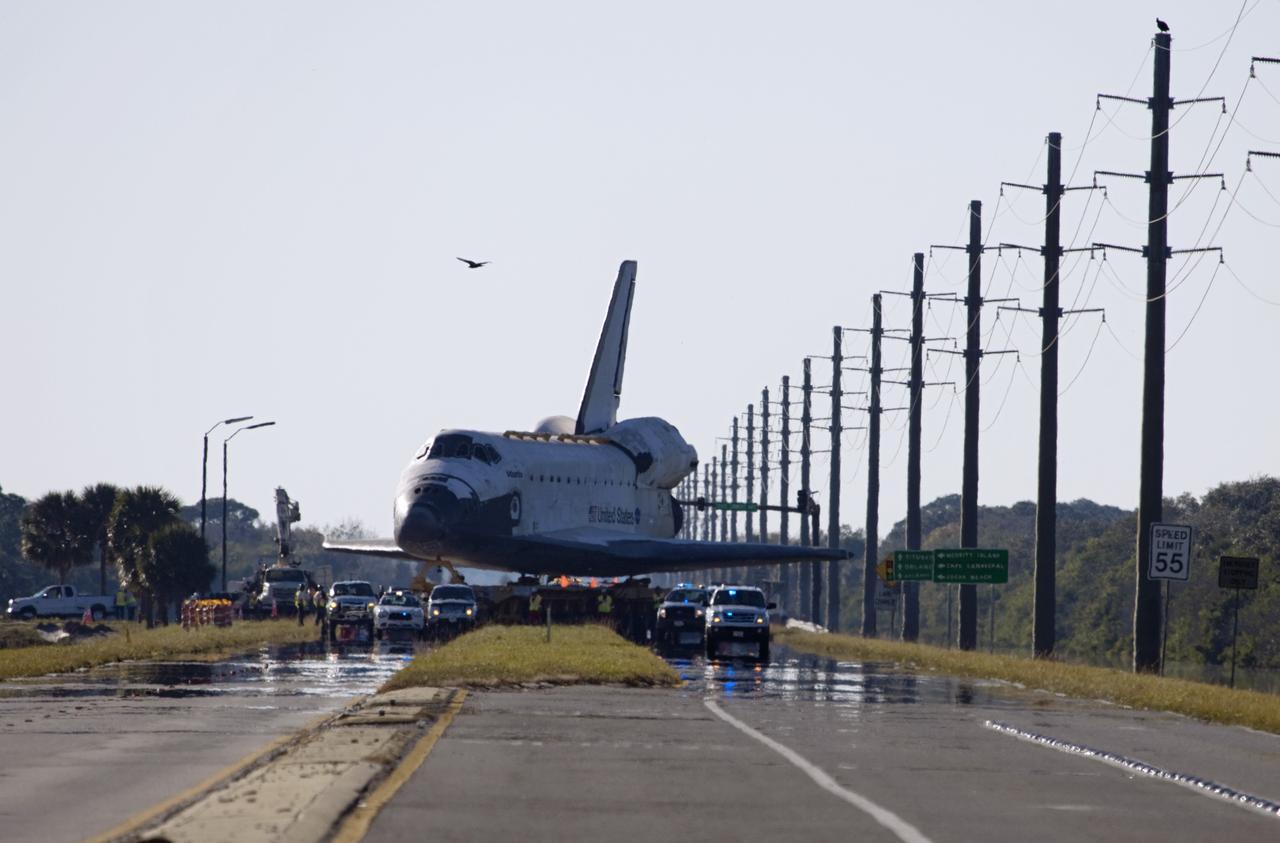 CAPE CANAVERAL, Fla. – Space shuttle Atlantis is transported along the NASA Causeway on its 10-mile journey from NASA Kennedy Space Center’s Vehicle Assembly Building in Florida to the Kennedy Visitor Complex where it will be put on public display. As part of transition and retirement of the Space Shuttle Program, Atlantis will be displayed at Kennedy’s Visitor Complex beginning in the summer of 2013. Over the course of its 26-year career, Atlantis traveled 125,935,769 miles during 307 days in space over 33 missions. For more information, visit http://www.nasa.gov/transition. Photo credit: NASA/Jim Grossmann