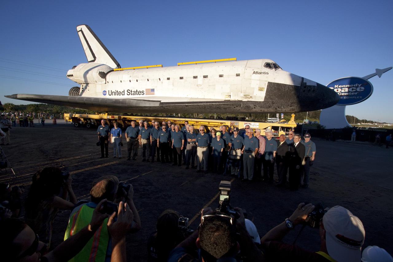 CAPE CANAVERAL, Fla. – Current and former NASA astronauts, including some who flew on missions aboard space shuttle Atlantis, pause for photographs before accompanying Atlantis into the Kennedy Space Center Visitor Complex in Florida. The astronauts walked the final portion of the shuttle’s 10-mile journey route. At far right, dressed in suits, are NASA Administrator Charlie Bolden and Kennedy Director Robert Cabana, both former astronauts. As part of transition and retirement of the Space Shuttle Program, Atlantis will be displayed at Kennedy’s Visitor Complex beginning in the summer of 2013. Over the course of its 26-year career, Atlantis traveled 125,935,769 miles during 307 days in space over 33 missions. For more information, visit http://www.nasa.gov/transition. Photo credit: NASA/Jim Grossmann