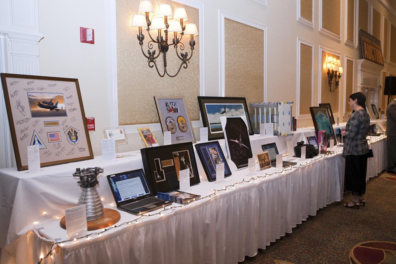CAPE CANAVERAL, Fla. – The Astronaut Scholarship Foundation hosts a dinner at the Radisson Resort at the Port in Cape Canaveral celebrating the 40th anniversary of Apollo 17. An auction of space-related memorabilia was held with proceeds supporting college scholarships for students who exhibit imagination and exceptional performance in science, technology, engineering and math.  The gala commemorating the anniversary of Apollo 17 included mission commander Eugene Cernan and other astronauts who flew Apollo missions. Launched Dec. 7, 1972, Cernan and lunar module pilot Harrison Schmitt landed in the moon's Taurus-Littrow highlands while command module pilot Ronald Evans remained in lunar orbit operating a scientific instrument module. For more information, visit http://www-pao.ksc.nasa.gov/history/apollo/apollo-17/apollo-17.htm Photo credit: NASA/Kim Shiflett
