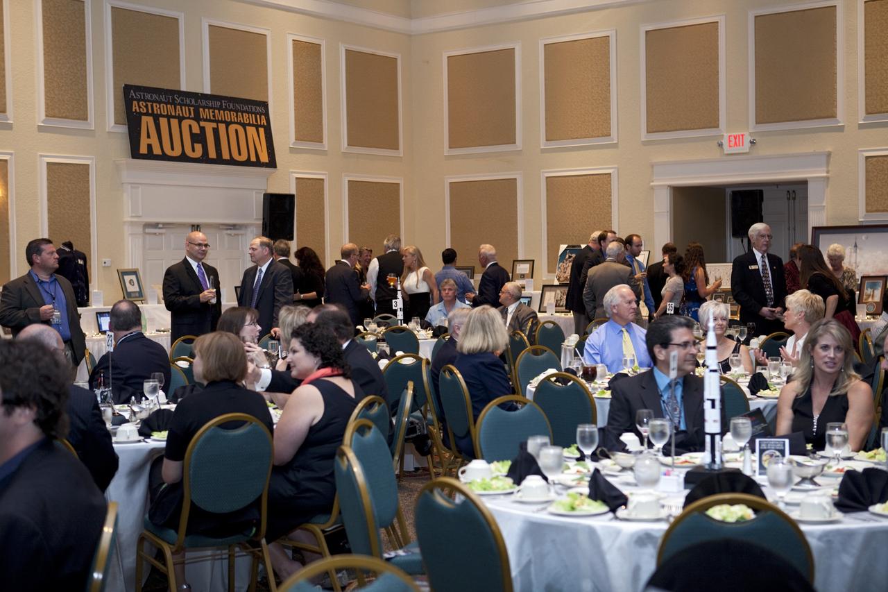 CAPE CANAVERAL, Fla. – Guests gather for the Astronaut Scholarship Foundation's dinner at the Radisson Resort at the Port in Cape Canaveral celebrating the 40th anniversary of Apollo 17.  The gala commemorating the anniversary of Apollo 17 included mission commander Eugene Cernan and other astronauts who flew Apollo missions. Launched Dec. 7, 1972, Cernan and lunar module pilot Harrison Schmitt landed in the moon's Taurus-Littrow highlands while command module pilot Ronald Evans remained in lunar orbit operating a scientific instrument module. For more information, visit http://www-pao.ksc.nasa.gov/history/apollo/apollo-17/apollo-17.htm Photo credit: NASA/Kim Shiflett