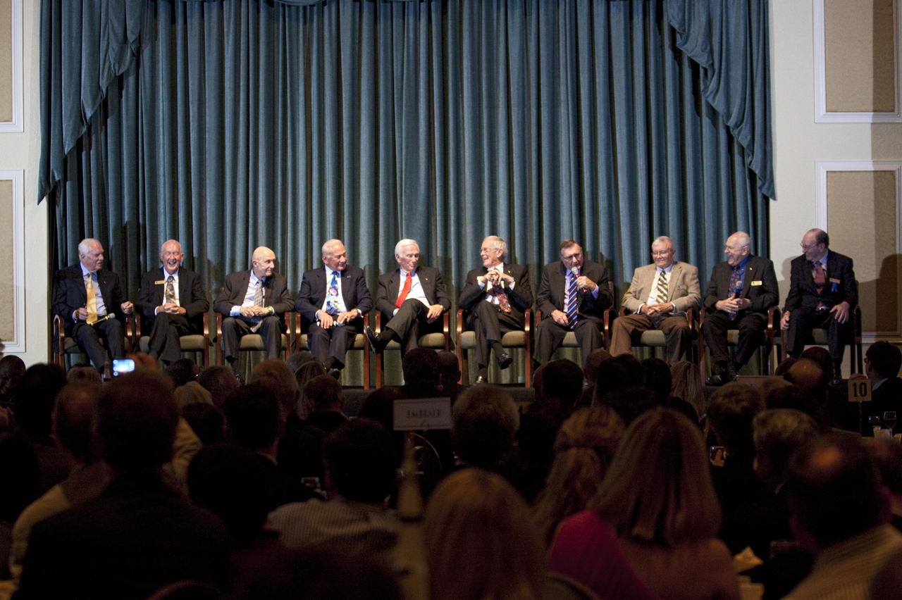 CAPE CANAVERAL, Fla. – Apollo astronauts, from the left, David Scott, James McDivitt, Thomas Stafford, Buzz Aldrin, Eugene Cernan, Charles Duke, Richard Gordon, Fred Haise, Alan Bean and Edgar Mitchell speak to guests gathered for the Astronaut Scholarship Foundation's dinner at the Radisson Resort at the Port in Cape Canaveral celebrating the 40th anniversary of Apollo 17.  The gala commemorating the anniversary of Apollo 17 included mission commander Eugene Cernan and other astronauts who flew Apollo missions. Launched Dec. 7, 1972, Cernan and lunar module pilot Harrison Schmitt landed in the moon's Taurus-Littrow highlands while command module pilot Ronald Evans remained in lunar orbit operating a scientific instrument module. For more information, visit http://www-pao.ksc.nasa.gov/history/apollo/apollo-17/apollo-17.htm Photo credit: NASA/Kim Shiflett