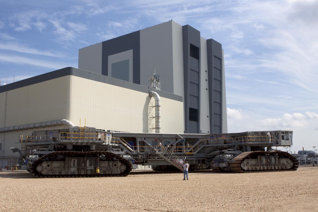 CAPE CANAVERAL, Fla. -- At NASA's Kennedy Space Center in Florida, crawler-transporter No. 2 is parked outside of the Vehicle Assembly Building. The Crawler-transporter has been undergoing modifications to ensure its ability to carry the space agency's Space Launch System heavy-lift rocket to the launch pad. NASA's Ground Systems Development and Operations Program is leading the 20-year life-extension project for the crawler. A pair of behemoth machines called crawler-transporters has carried the load of taking rockets and spacecraft to the launch pad for more than 40 years at NASA’s Kennedy Space Center in Florida. Each the size of a baseball infield and powered by locomotive and large electrical power generator engines, the crawler-transporters will stand ready to keep up the work for the next generation of launch vehicles projects to lift astronauts into space. For more information, visit http://www.nasa.gov/exploration/systems/ground/index.html Photo credit: NASA/Jim Grossmann