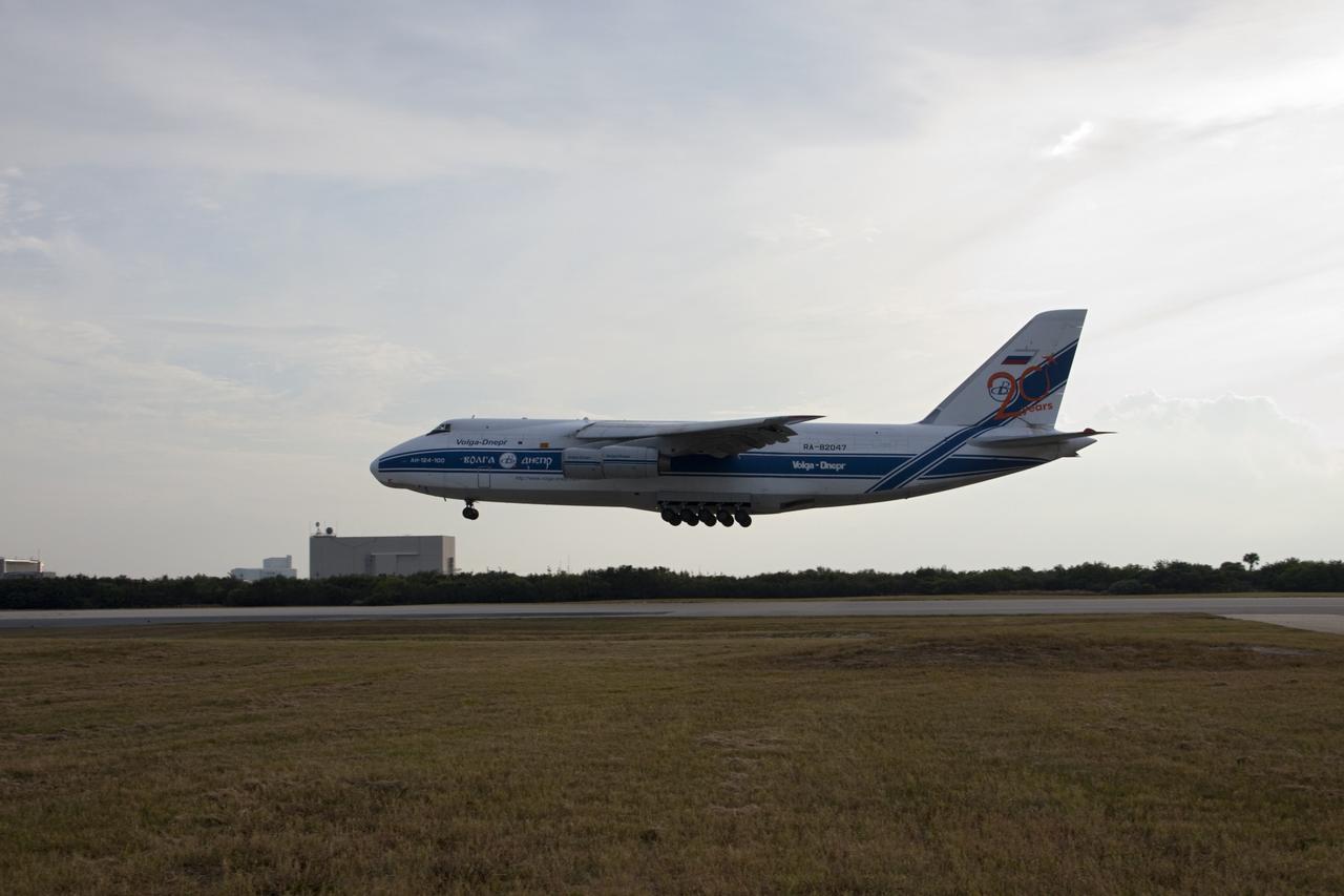 CAPE CANAVERAL, Fla. -- A Ukrainian Antonov-124 transport aircraft prepares to touch down at Cape Canaveral Air Force Station in Florida with the first stage of the Atlas V rocket that will carry the Tracking and Data Relay Satellite, TDRS-K, into orbit. The booster stage, arriving from the United Launch Alliance manufacturing plant in Decatur, Ala., will be taken to the hangar at the Atlas Spaceflight Operations Center at Cape Canaveral. Launch of the TDRS-K on the Atlas V rocket is planned for January 2013 from Space Launch Complex 41. The TDRS-K spacecraft is part of the next-generation series in the Tracking and Data Relay Satellite System, a constellation of space-based communication satellites providing tracking, telemetry, command and high-bandwidth data return services. For more information, visit http://tdrs.gsfc.nasa.gov/. Photo credit: NASA/Tim Jacobs