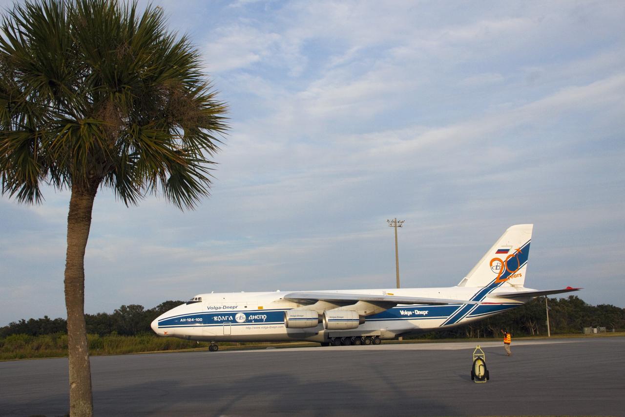 CAPE CANAVERAL, Fla. -- A Ukrainian Antonov-124 transport aircraft arrives at Cape Canaveral Air Force Station in Florida with the first stage of the Atlas V rocket that will carry the Tracking and Data Relay Satellite, TDRS-K, into orbit. The booster stage, arriving from the United Launch Alliance manufacturing plant in Decatur, Ala., will be taken to the hangar at the Atlas Spaceflight Operations Center at Cape Canaveral. Launch of the TDRS-K on the Atlas V rocket is planned for January 2013 from Space Launch Complex 41. The TDRS-K spacecraft is part of the next-generation series in the Tracking and Data Relay Satellite System, a constellation of space-based communication satellites providing tracking, telemetry, command and high-bandwidth data return services. For more information, visit http://tdrs.gsfc.nasa.gov/. Photo credit: NASA/Tim Jacobs