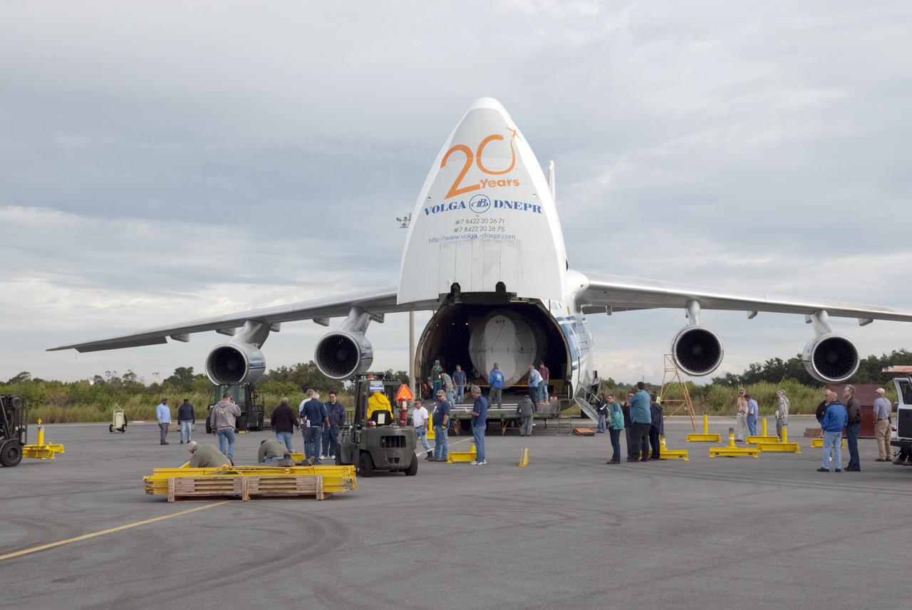CAPE CANAVERAL, Fla. -- A Ukrainian Antonov-124 transport aircraft arrives at Cape Canaveral Air Force Station in Florida with the first stage of the Atlas V rocket that will carry the Tracking and Data Relay Satellite, TDRS-K, into orbit. The booster stage, arriving from the United Launch Alliance manufacturing plant in Decatur, Ala., will be taken to the hangar at the Atlas Spaceflight Operations Center at Cape Canaveral to begin processing. Launch of the TDRS-K on the Atlas V rocket is planned for January 2013 from Space Launch Complex 41. The TDRS-K spacecraft is part of the next-generation series in the Tracking and Data Relay Satellite System, a constellation of space-based communication satellites providing tracking, telemetry, command and high-bandwidth data return services. For more information, visit http://tdrs.gsfc.nasa.gov/ Photo credit: NASA/Charisse Nahser