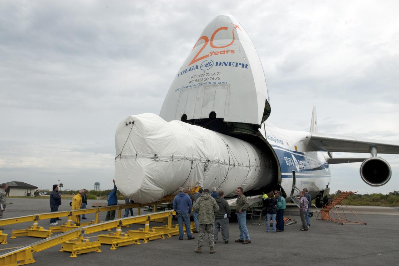 CAPE CANAVERAL, Fla. -- The first stage of the Atlas V rocket that will carry the Tracking and Data Relay Satellite, TDRS-K, into orbit is off loaded from a Ukrainian Antonov-124 transport aircraft after its arrival at Cape Canaveral Air Force Station in Florida. The booster stage was delivered from the United Launch Alliance manufacturing plant in Decatur, Ala., and will be taken to the hangar at the Atlas Spaceflight Operations Center at Cape Canaveral to begin processing. Launch of the TDRS-K on the Atlas V rocket is planned for January 2013 from Space Launch Complex 41. The TDRS-K spacecraft is part of the next-generation series in the Tracking and Data Relay Satellite System, a constellation of space-based communication satellites providing tracking, telemetry, command and high-bandwidth data return services. For more information, visit http://tdrs.gsfc.nasa.gov/ Photo credit: NASA/Charisse Nahser