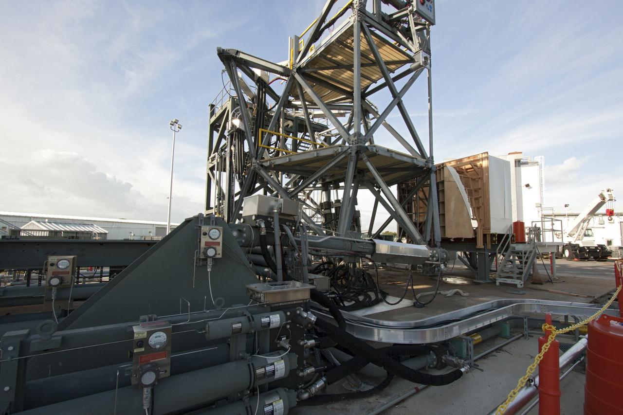 CAPE CANAVERAL, Fla. – The Orion spacecraft crew access arm, or CAA, seal prototype is being checked out at the Launch Equipment Test Facility at NASA's Kennedy Space Center in Florida. The tests will use a mockup of the vehicle Outer Mold Line and CAA white room to test the performance of the seal while simulating vehicle to CAA white room excursions. Orion is the exploration spacecraft designed to carry crews to space beyond low Earth orbit. It will provide emergency abort capability, sustain the crew during the space travel and provide safe re-entry from deep space return velocities. The first unpiloted test flight of the Orion is scheduled to launch in 2014 atop a Delta IV rocket and in 2017 on a Space Launch System rocket. For more information, visit http://www.nasa.gov/orion Photo credit: NASA/Jim Grossmann