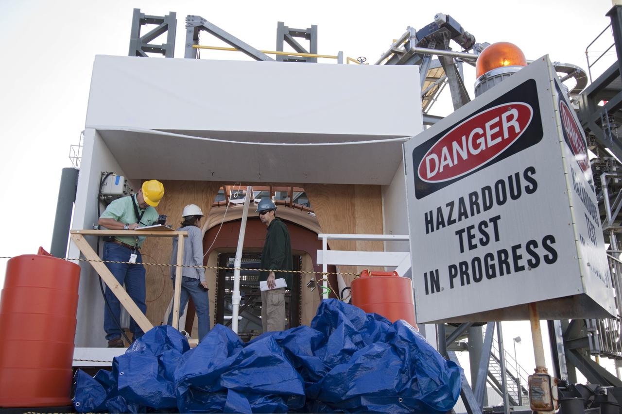 CAPE CANAVERAL, Fla. – The Orion spacecraft crew access arm, or CAA, seal prototype is being checked by technicians and engineers at the Launch Equipment Test Facility at NASAs Kennedy Space Center in Florida. The tests will use a mockup of the vehicle Outer Mold Line and CAA white room to assess the performance of the seal while simulating vehicle to CAA white room excursions. Orion is the exploration spacecraft designed to carry crews to space beyond low Earth orbit. It will provide emergency abort capability, sustain the crew during the space travel and provide safe re-entry from deep space return velocities. The first unpiloted test flight of the Orion is scheduled to launch in 2014 atop a Delta IV rocket and in 2017 on a Space Launch System rocket. For more information, visit http://www.nasa.gov/orion Photo credit: NASA/Jim Grossmann