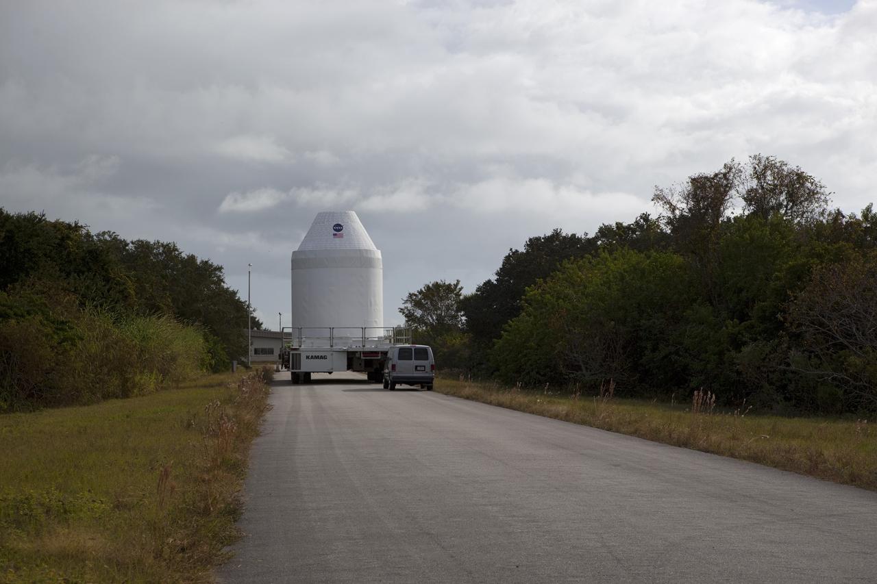 CAPE CANAVERAL, Fla. – A full-size test mock-up of the Orion spacecraft is being transferred to the Vehicle Assembly Building at NASA's Kennedy Space Center in Florida to test the path flight hardware will take during future launch processing. Orion is the exploration spacecraft designed to carry crews to space beyond low Earth orbit. It will provide emergency abort capability, sustain the crew during the space travel and provide safe re-entry from deep space return velocities. The first unpiloted test flight of the Orion is scheduled to launch in 2014 atop a Delta IV rocket and in 2017 on a Space Launch System rocket. For more information, visit http://www.nasa.gov/orion Photo credit: NASA/Dimitri Gerondidakis