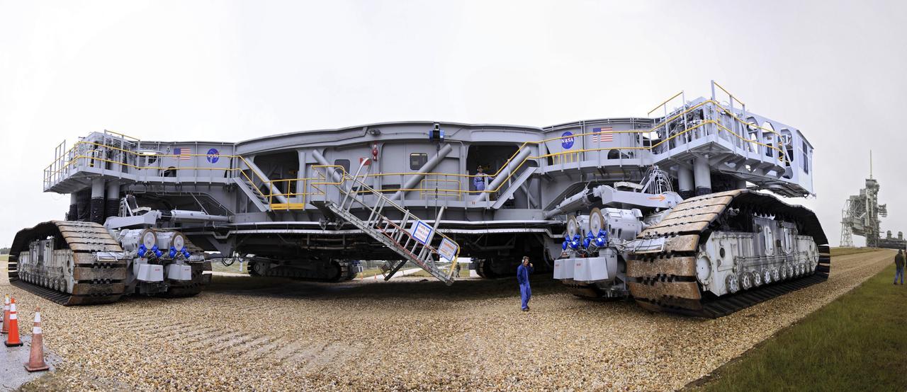 CAPE CANAVERAL, Fla. -- In this wide-angle, panoramic view, crawler-transporter No. 2 is undergoing testing at Launch Pad 39A at NASA's Kennedy Space Center in Florida. The activity is designed to check out recently completed modifications to ensure its ability to carry launch vehicles such as the space agency's Space Launch System heavy-lift rocket to the pad. NASA's Ground Systems Development and Operations Program is leading the 20-year life-extension project for the crawler. A pair of behemoth machines called crawler-transporters has carried the load of taking rockets and spacecraft to the launch pad for more than 40 years at NASA’s Kennedy Space Center in Florida. Each weighing six and a half million pounds and larger in size than a professional baseball infield, the crawler-transporters are powered by locomotive and large electrical power generator engines. The crawler-transporters will stand ready to keep up the work for the next generation of launch vehicles to lift astronauts into space. For more information, visit http://www.nasa.gov/exploration/systems/ground/index.html Photo credit: NASA/ Jim Grossmann