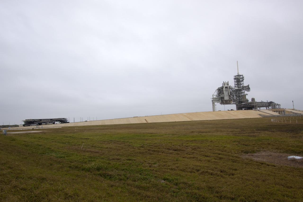CAPE CANAVERAL, Fla. -- At NASA's Kennedy Space Center in Florida, crawler-transporter No. 2 moves up the gravel crawler way at Launch Pad 39A. The crawler-transporter is undergoing testing to check out recently completed modifications to ensure its ability to carry launch vehicles such as the space agency's Space Launch System heavy-lift rocket to the pad. NASA's Ground Systems Development and Operations Program is leading the 20-year life-extension project for the crawler. A pair of behemoth machines called crawler-transporters has carried the load of taking rockets and spacecraft to the launch pad for more than 40 years at NASA’s Kennedy Space Center in Florida. Each weighing six and a half million pounds and larger in size than a professional baseball infield, the crawler-transporters are powered by locomotive and large electrical power generator engines. The crawler-transporters will stand ready to keep up the work for the next generation of launch vehicles to lift astronauts into space. For more information, visit http://www.nasa.gov/exploration/systems/ground/index.html Photo credit: NASA/ Jim Grossmann