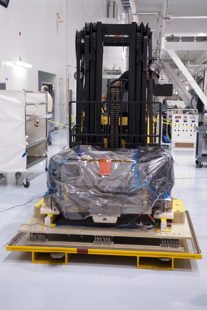 CAPE CANAVERAL, Fla. -- Inside the Space Station Processing Facility at NASA's Kennedy Space Center in Florida, workers have prepared the orbital replacement unit for the space station's main bus switching unit to be placed in a shipping container.       The unit, which was processed at Kennedy, will be shipped to Japan at the beginning of the year for the HTV-4 launch, which is currently scheduled for 2013. Photo credit: NASA/Charisse Nahser