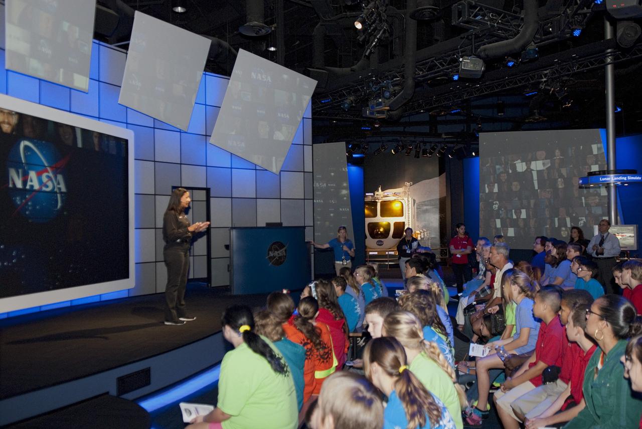 CAPE CANAVERAL, Fla. – At the Kennedy Space Center Visitor Complex in Florida sixth-grade students listen to a science presentation on NASA programs.      Between Nov. 26 and Dec. 7, 2012, about 5,300 sixth-graders in Brevard County, Florida were bused to Kennedy's Visitor Complex for Brevard Space Week, an educational program designed to encourage interest in science, technology, engineering and mathematics STEM careers. Photo credit: NASA/Tim Jacobs