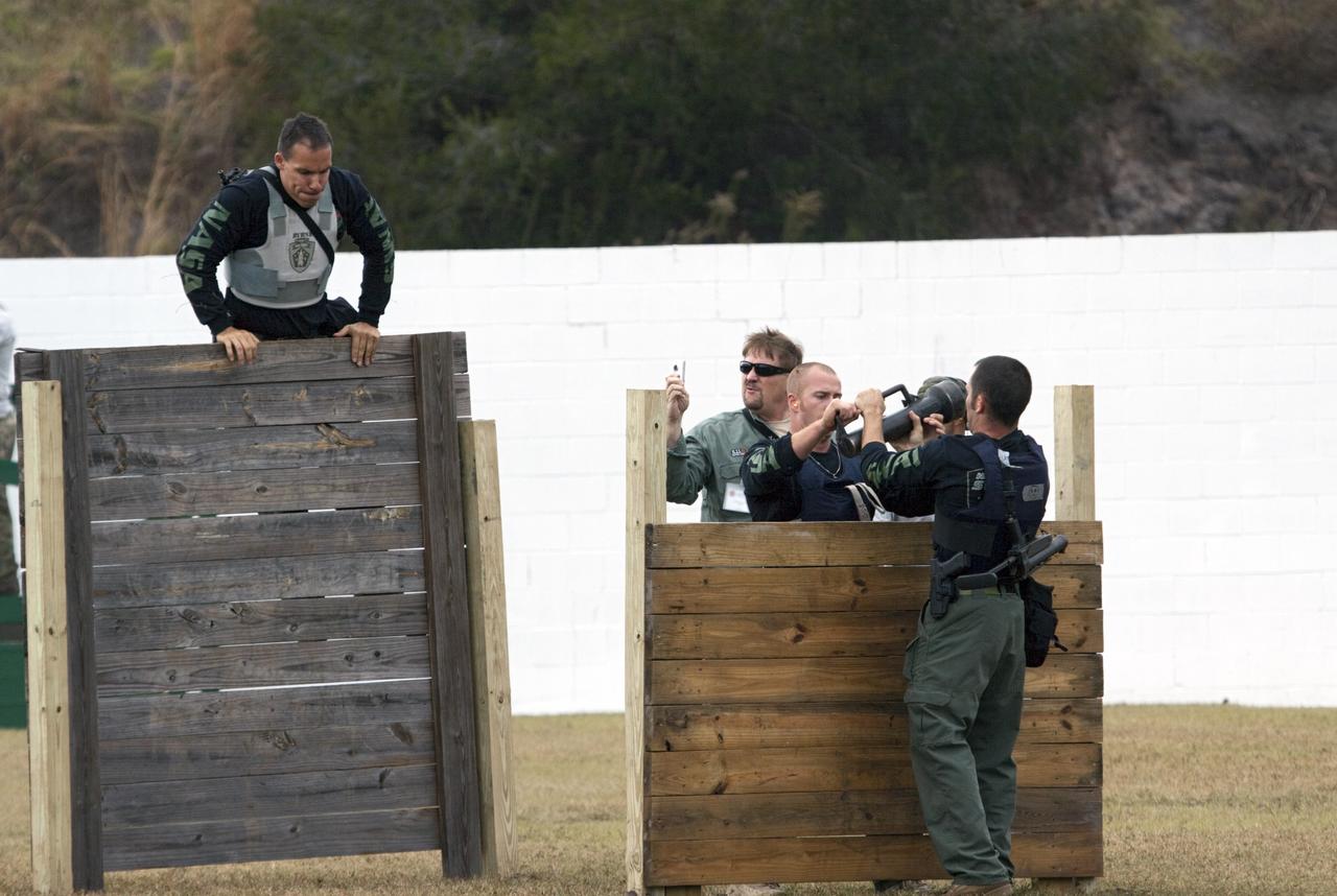 ORLANDO, Fla. – The Emergency Response Team, or ERT, from NASA's Kennedy Space Center competes in the 30th Annual SWAT Round-Up International in Orlando, Florida.  The competition pits special operations squads from law enforcement agencies around the world in races against time through obstacle courses and shooting ranges. Photo credit: NASA/Jim Grossmann