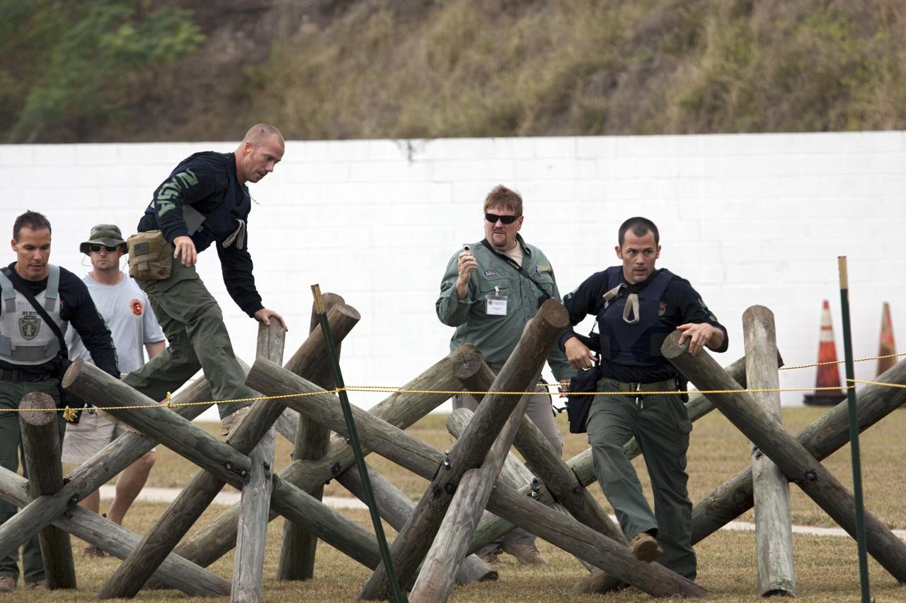 ORLANDO, Fla. – The Emergency Response Team, or ERT, from NASA's Kennedy Space Center competes in the 30th Annual SWAT Round-Up International in Orlando, Florida.  The competition pits special operations squads from law enforcement agencies around the world in races against time through obstacle courses and shooting ranges. Photo credit: NASA/Jim Grossmann
