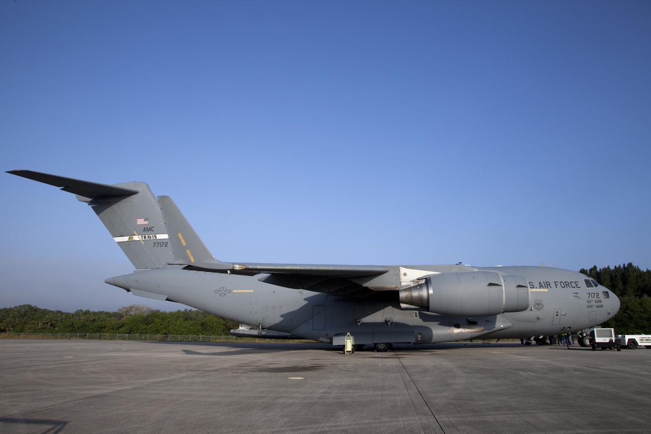 CAPE CANAVERAL, Fla. -- The Tracking and Data Relay Satellite known as TDRS-K arrives at NASA's Kennedy Space Center in Florida aboard an Air Force C-17 transport aircraft at 8:29 a.m. Dec. 18 at the agency's Kennedy Space Center in Florida in preparation for a Jan. 29 launch to a location in geostationary orbit. TDRS-K flew aboard a U.S. Air Force C-17 from the Boeing Space and Intelligence Systems assembly facility in El Segundo, Calif., for final preparation to launch aboard a United Launch Alliance Atlas V rocket. TDRS-K is the first of three next-generation satellites designed to ensure vital operational continuity for NASA by expanding the lifespan of the fleet. Each of the new satellites has a higher performance solar panel design to provide more spacecraft power. This upgrade will return signal processing for the S-Band multiple access service to the ground -- the same as the first-generation TDRS spacecraft. Ground-based processing allows TDRS to service more customers with different and evolving communication requirements. For more information, visit http://tdrs.gsfc.nasa.gov/ Photo credit: NASA/Kim Shiflett