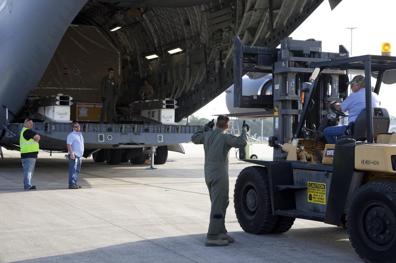CAPE CANAVERAL, Fla. -- The Tracking and Data Relay Satellite known as TDRS-K arrives at NASA's Kennedy Space Center in Florida aboard an Air Force C-17 transport aircraft at 8:29 a.m. Dec. 18 at the agency's Kennedy Space Center in Florida in preparation for a Jan. 29 launch to a location in geostationary orbit. TDRS-K flew aboard a U.S. Air Force C-17 from the Boeing Space and Intelligence Systems assembly facility in El Segundo, Calif., for final preparation to launch aboard a United Launch Alliance Atlas V rocket. TDRS-K is the first of three next-generation satellites designed to ensure vital operational continuity for NASA by expanding the lifespan of the fleet. Each of the new satellites has a higher performance solar panel design to provide more spacecraft power. This upgrade will return signal processing for the S-Band multiple access service to the ground -- the same as the first-generation TDRS spacecraft. Ground-based processing allows TDRS to service more customers with different and evolving communication requirements. For more information, visit http://tdrs.gsfc.nasa.gov/ Photo credit: NASA/Kim Shiflett